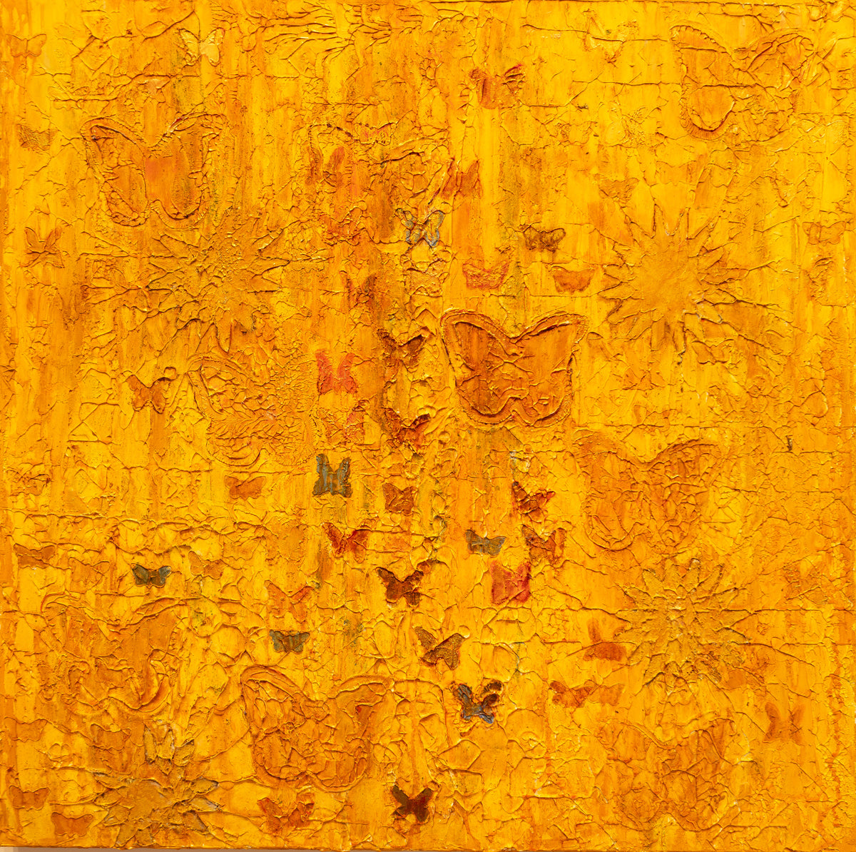 Square textured saffron and gold painting with embossed butterflies, sun medallions and a carved geometric lattice.