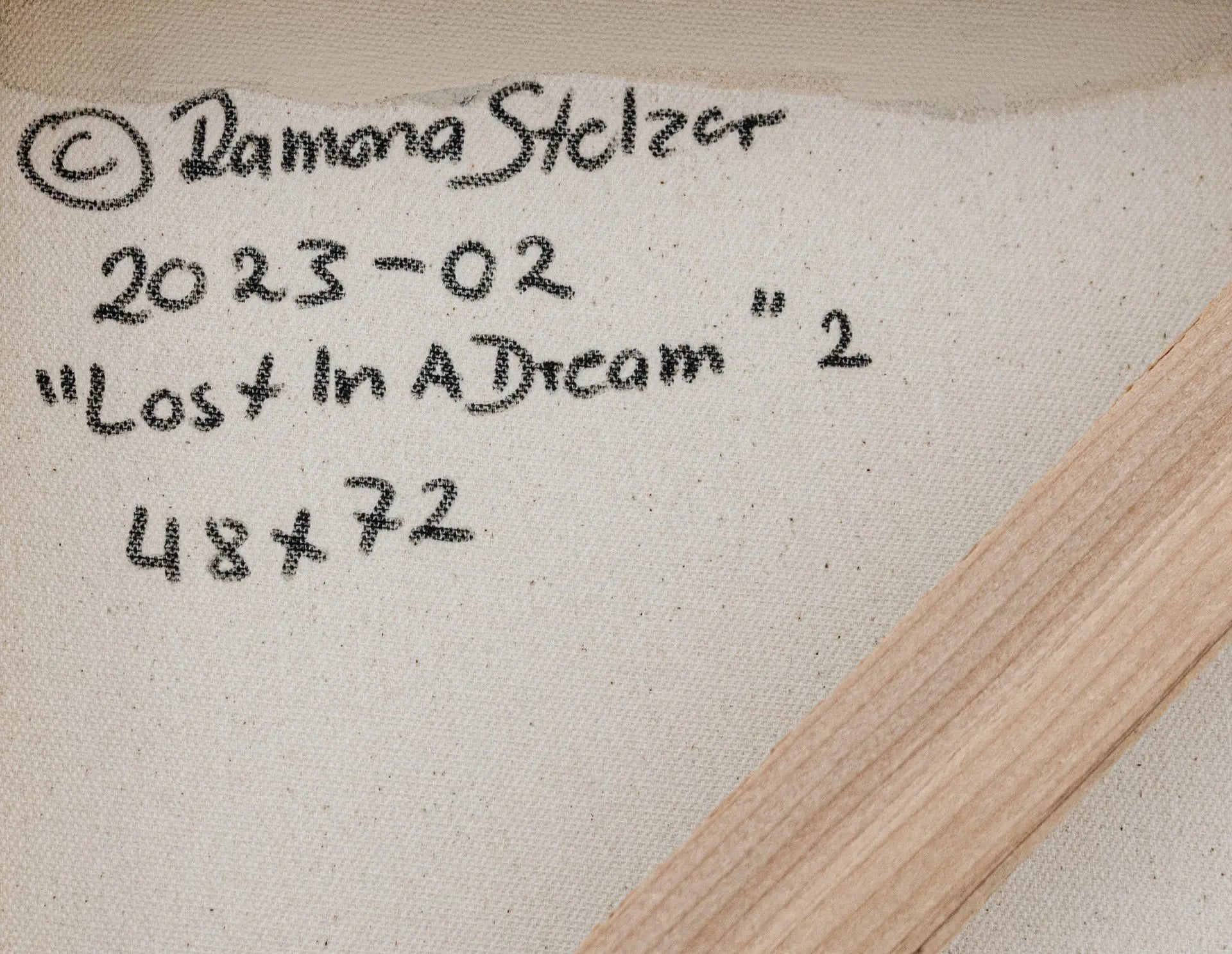 A detailed close up photo of the artist's signature and copyright on the back of a large floral painting Lost in a Dream #2 by Ramona Stelzer